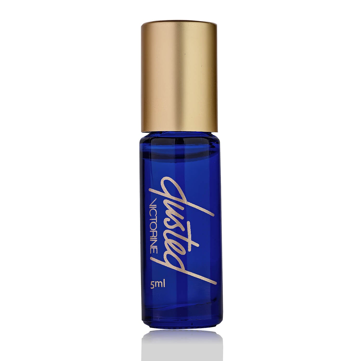 Dusted terpene fragrance product in a narrow blue glass bottle with slanted gold handwriting reading "dusted" and narrow font reading "VICTORINE". 5ml printed on bottle.